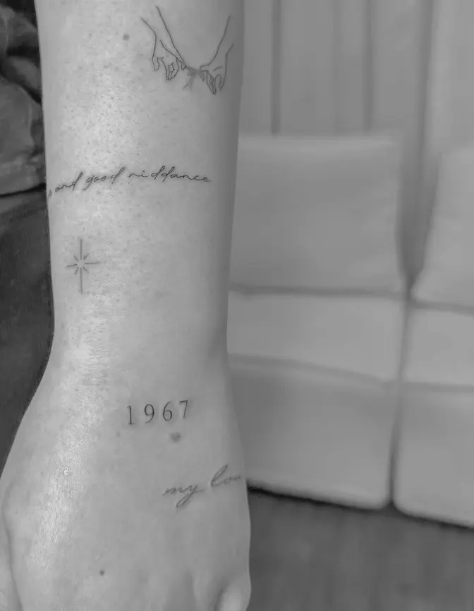 Fine line hands reaching with script text tattoo by Chelsea.Q at Omnia Tattoo Studio
